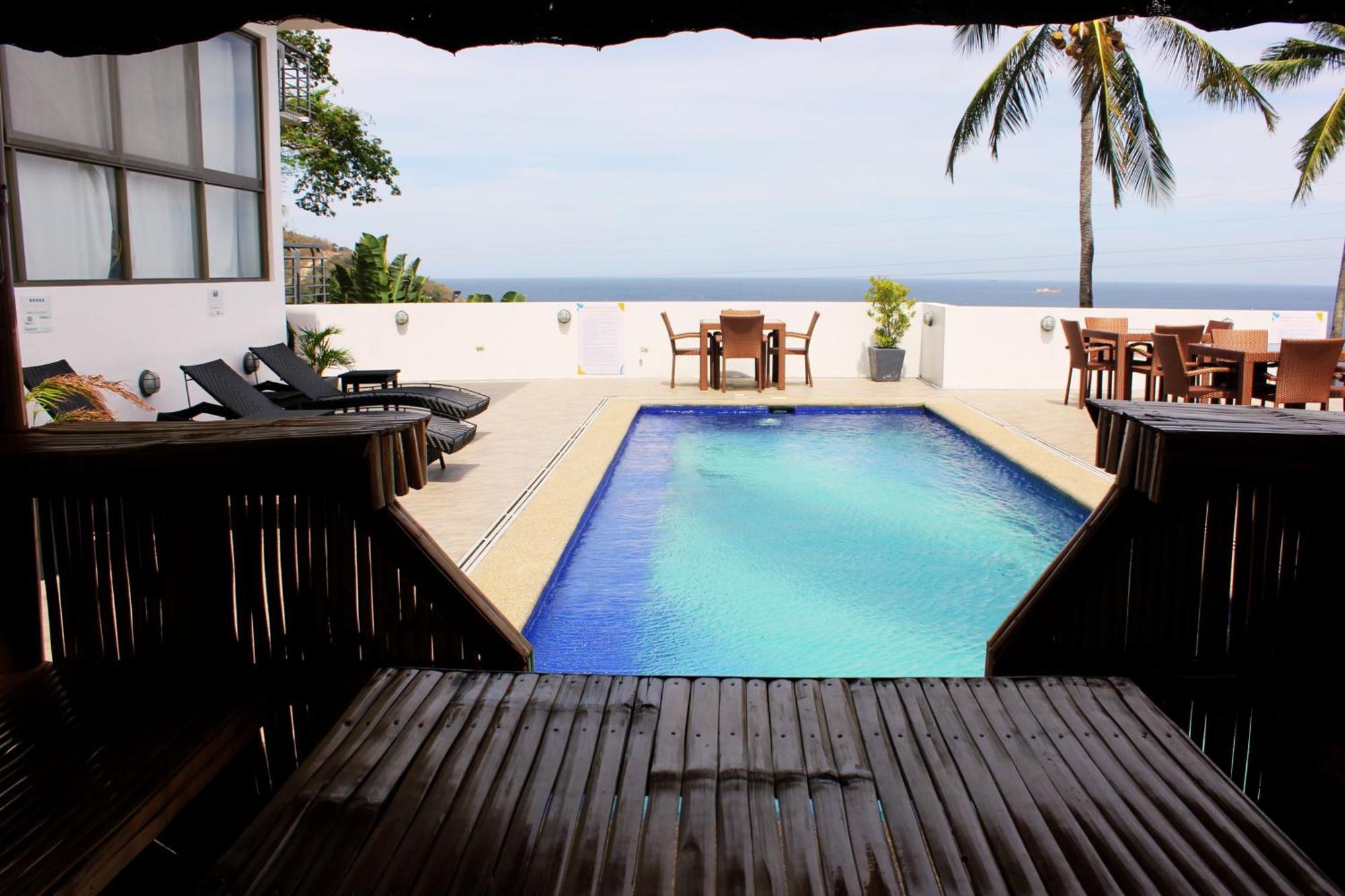 Av Suites Puerto Galera Exterior photo